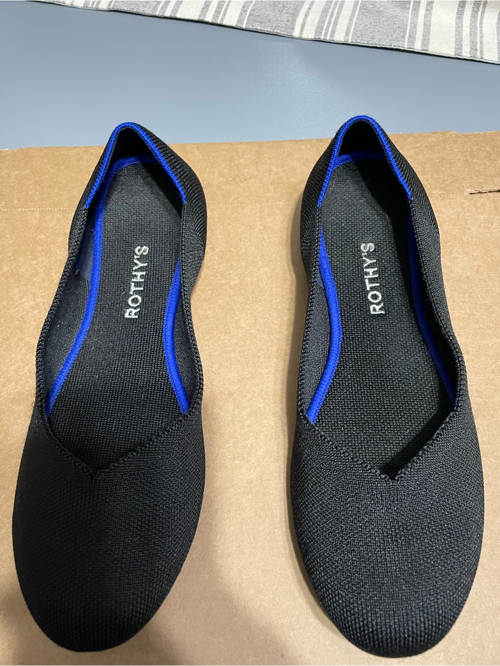 Rothy's Black Flats with Blue Trim